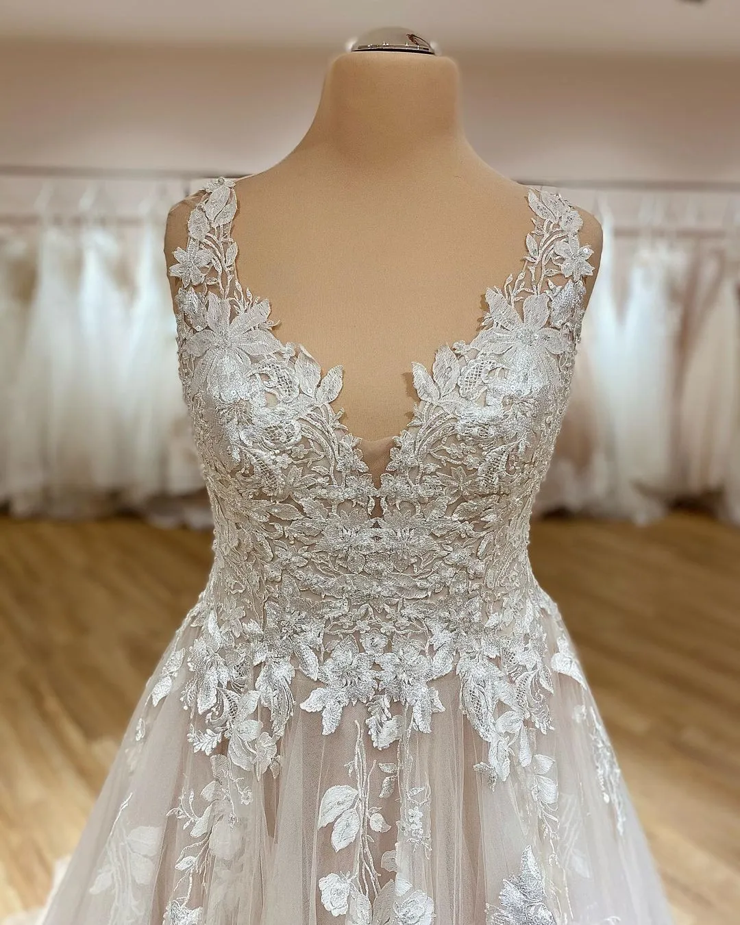 Elegant Deep V-Neck A-Line Spaghetti Strap Wedding Dress with Ruffles and Tulle Lace Appliques