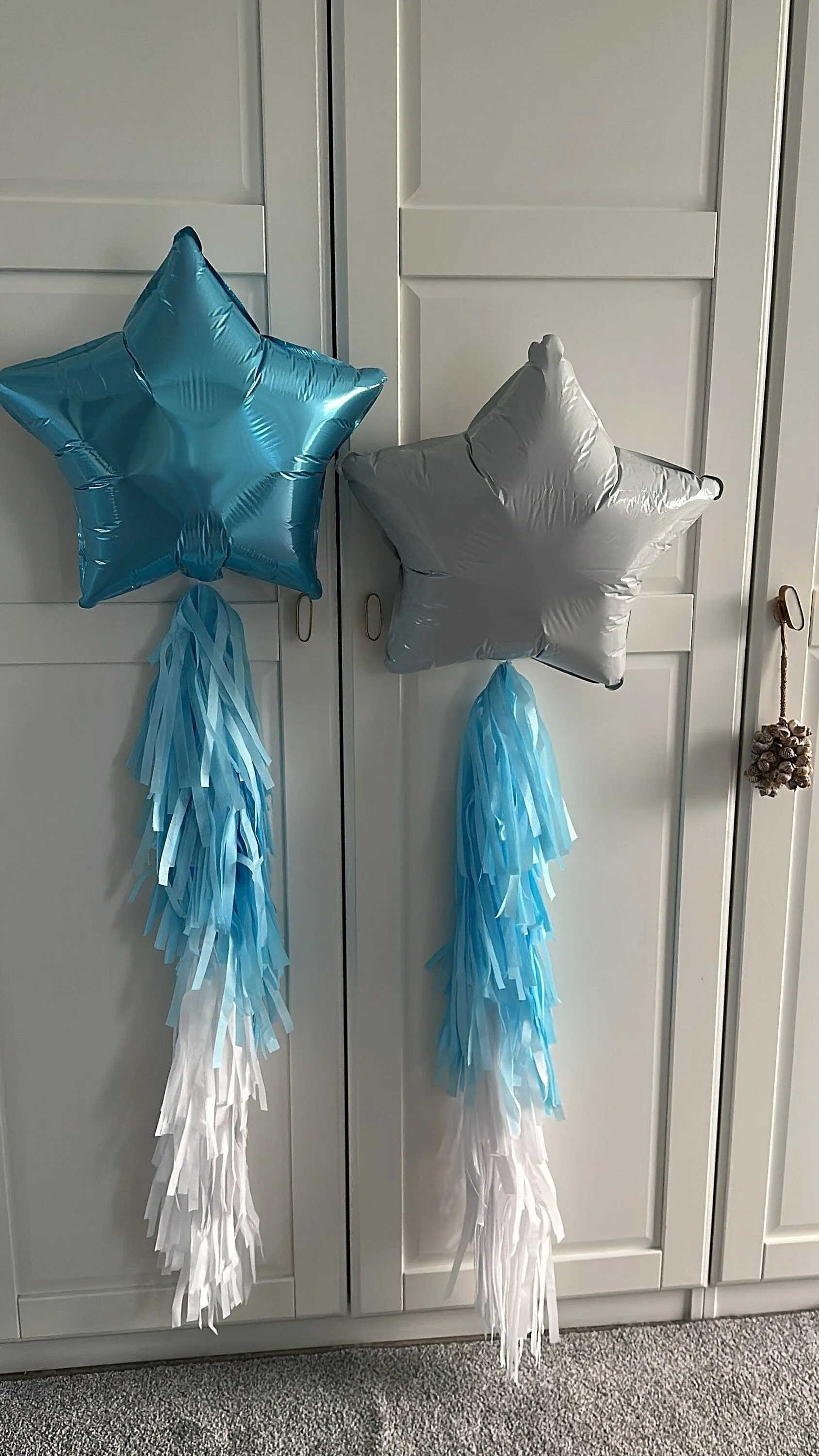 White and blue star shaped balloons with tassel tail ice winter wonderland birthday decorations- fully assembled ready to use